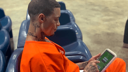 Inmates graduate high school with tablets